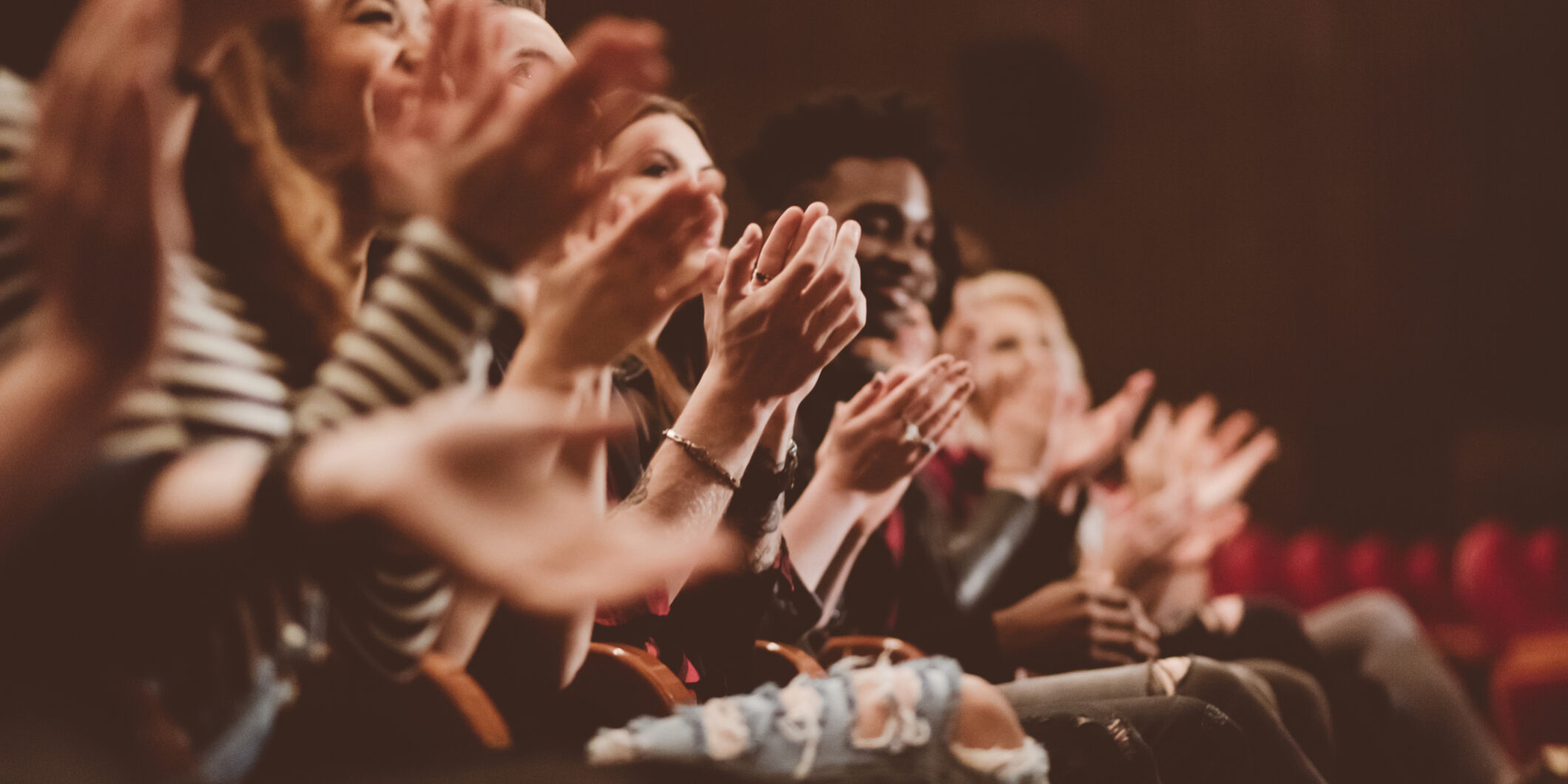 Audience applauding in the theater
